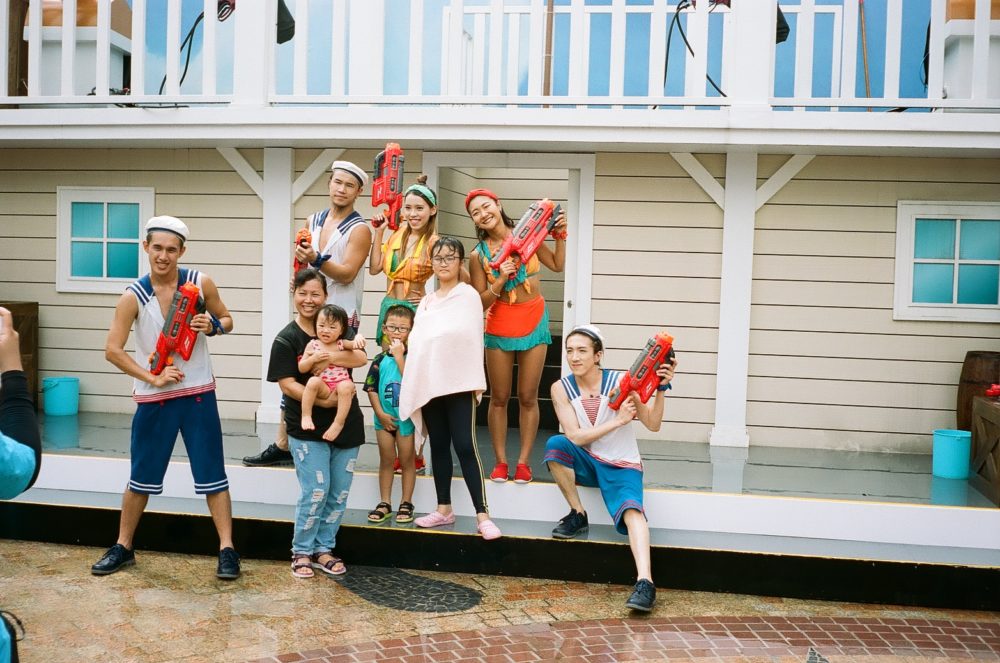 posing with performers at Ocean Park, Hong Kong