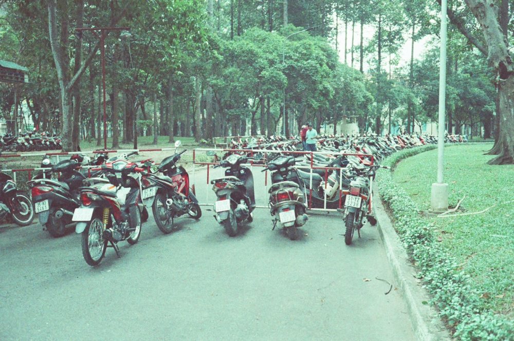 parked scooters at the Reunification Palace in Ho Chi Minh City, Vietnam