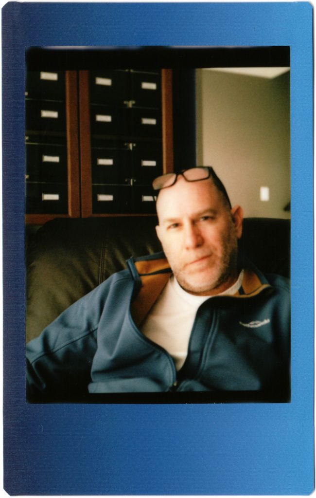 self-portrait shot with Mamiya C220 on Instax Mini film
