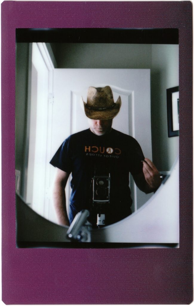 cowboy selfie (first attempt) shot with Mamiya C220 on Instax Mini film