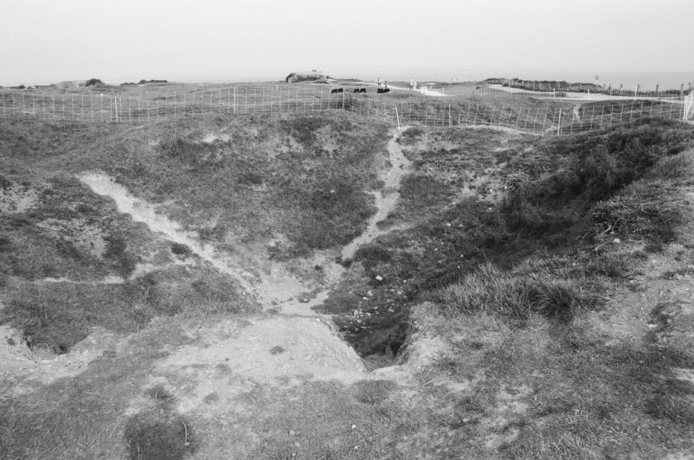 bomb crater at Pointe du Hoc