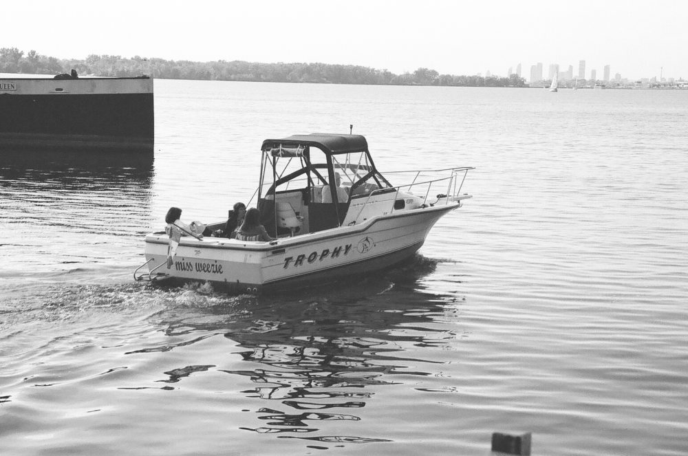 aboard the Miss Weezie boating on Lake Ontario