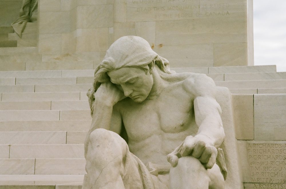 statue of male mourner at Vimy Memorial