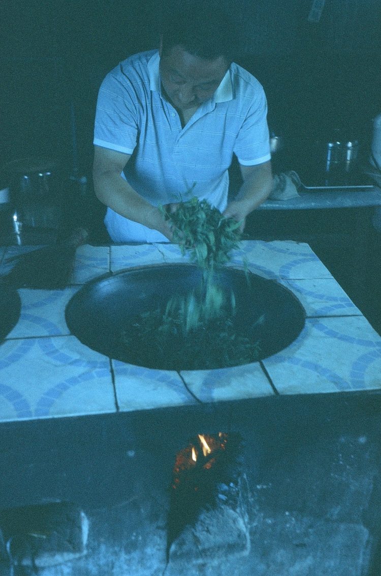 pan-firing tea leaves in Emeishan, China