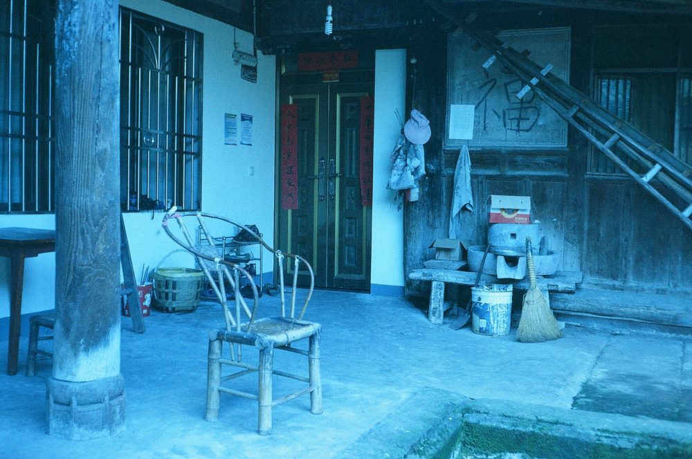 the courtyard of an old home in Emeishan, China