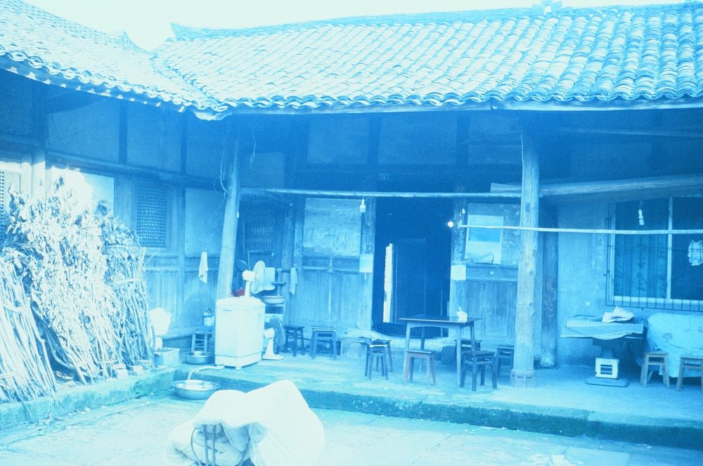 the courtyard of an old home in Emeishan, China