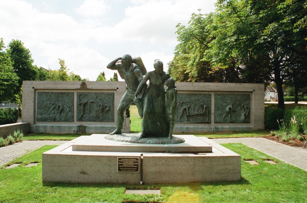 statue of immigrants at Hastings Park, Vancouver, BC