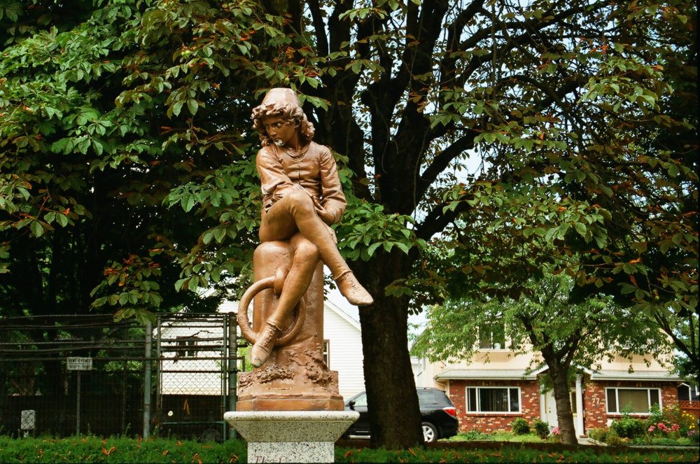 statue of a young Christopher Columbus at Hastings Park