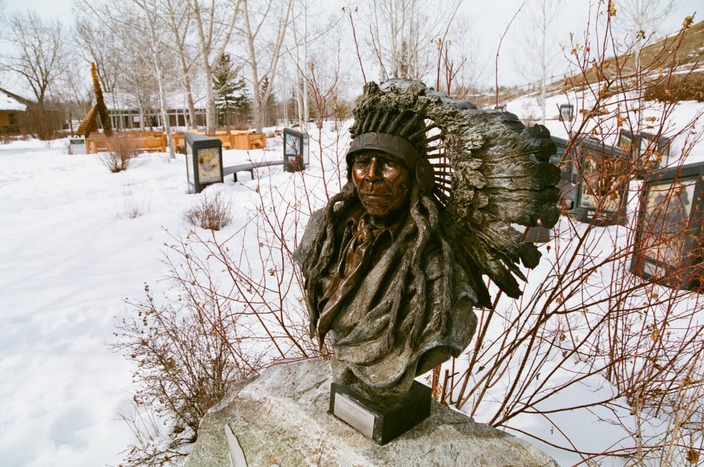 First Nations statue in Artisan Gardens at Bow Valley Ranch