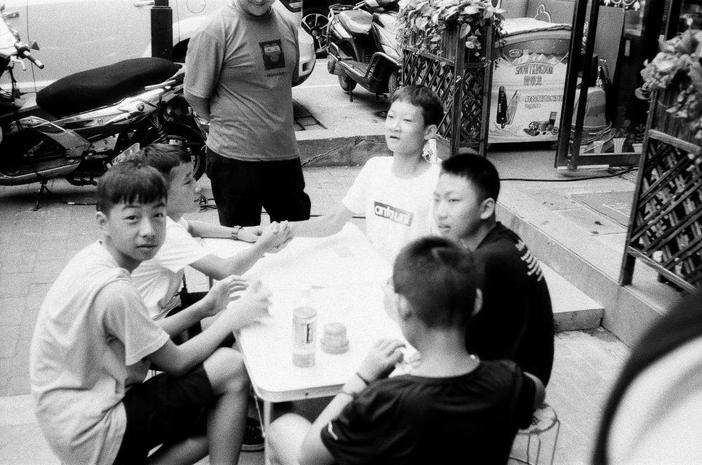 boys playing cards in Xi'an, China