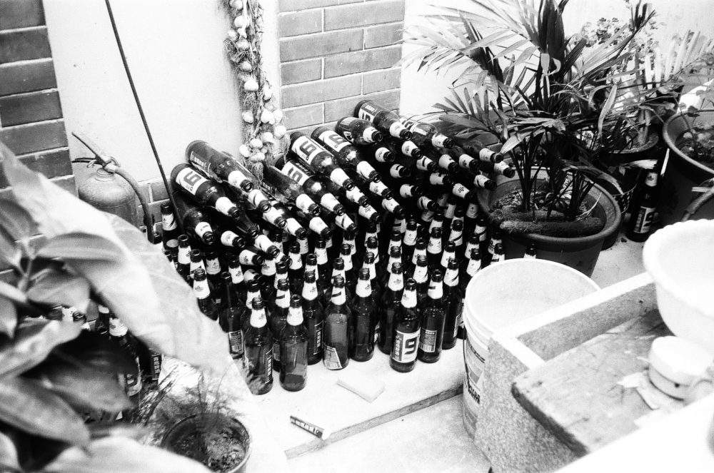 empty beer bottles stacked in Xi'an, China