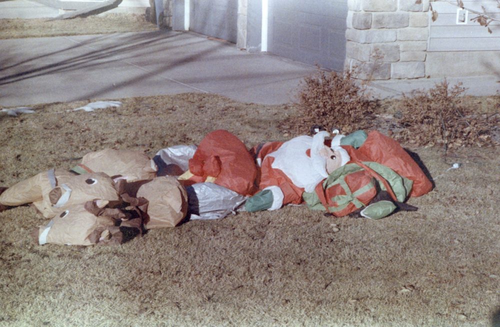 deflated Santa and his reindeer