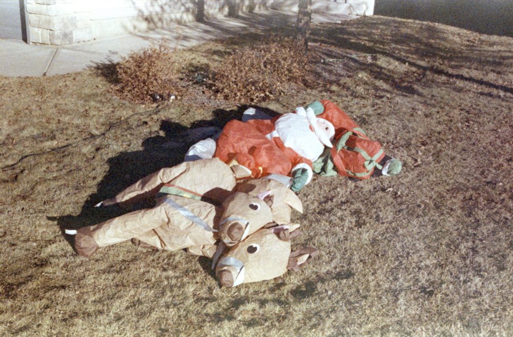 deflated Santa and his reindeer
