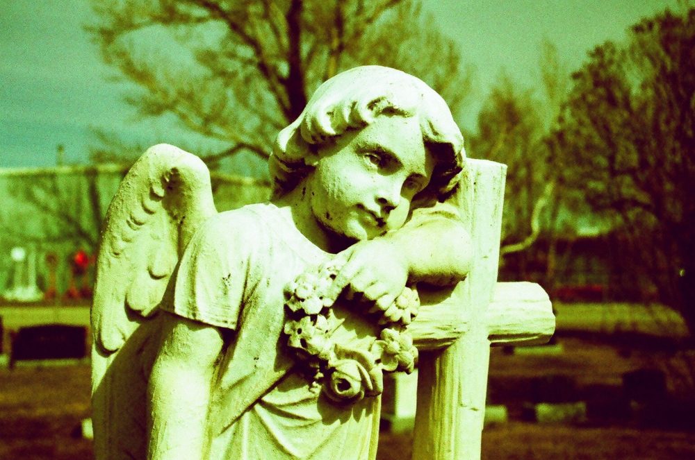 cherub statue in Burnsland Cemetery