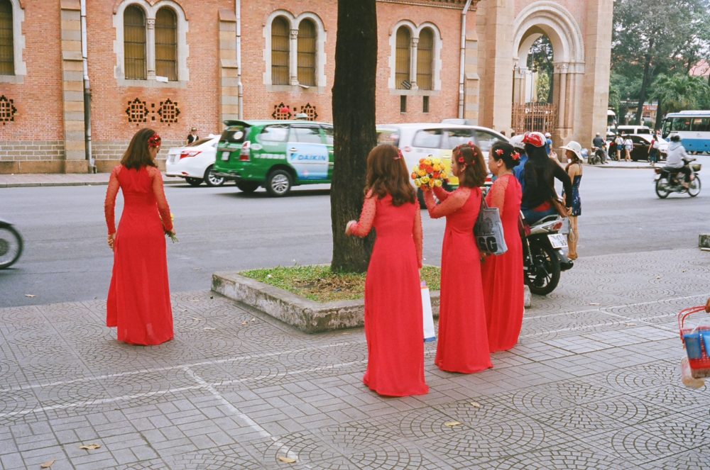preparing for a wedding outside Notre-Dame Cathedral in Ho Chi Minh City, Vietnam