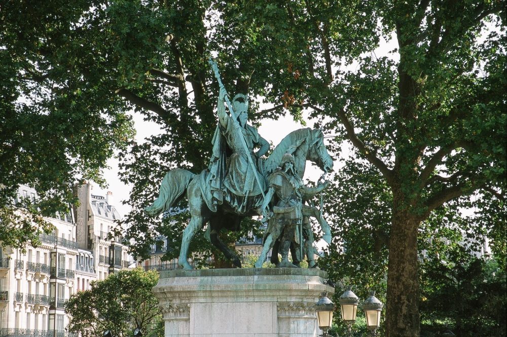 a statue near Notre Dame in Paris