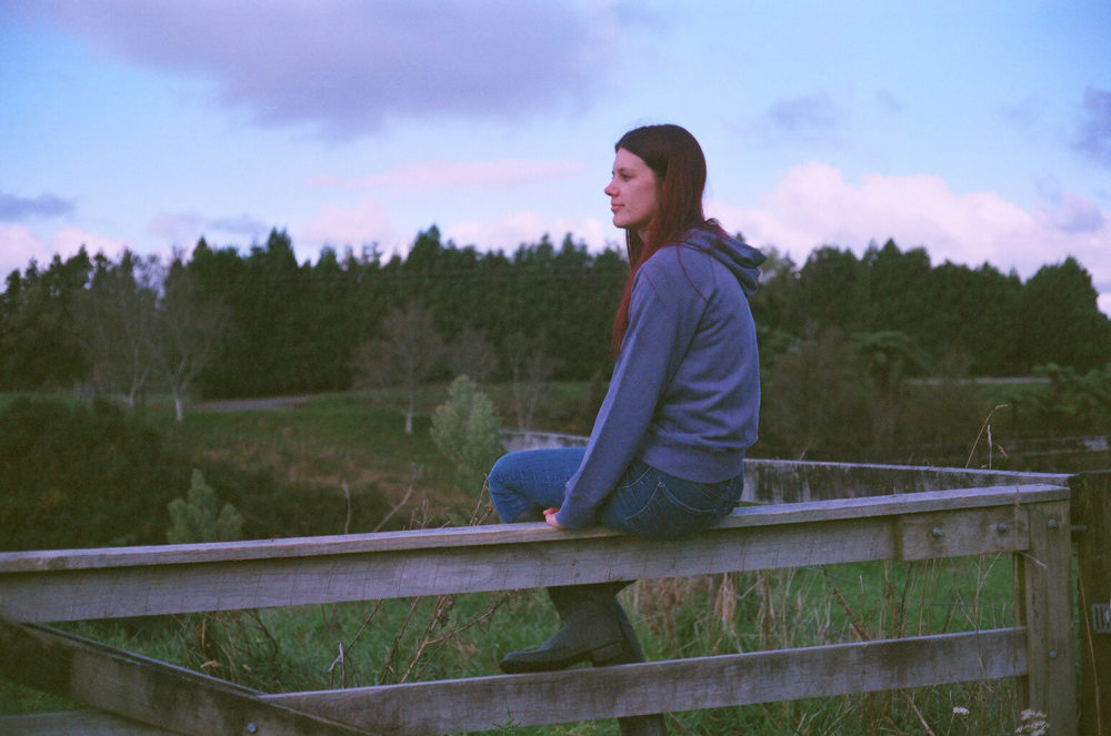 sitting on a fence