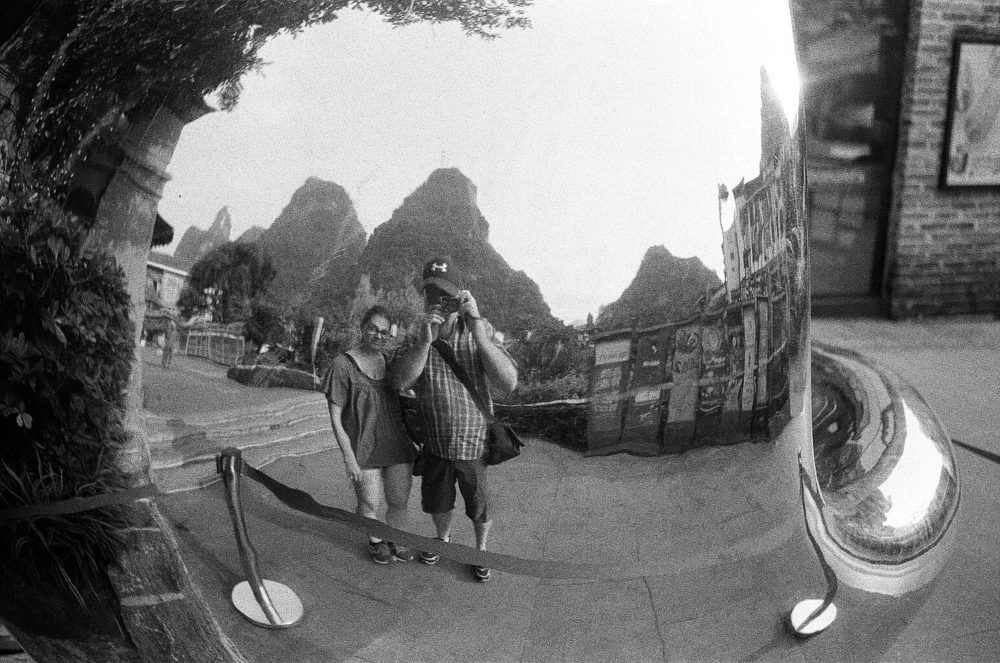 selfie in a mirror sculpture, Yangshuo, China