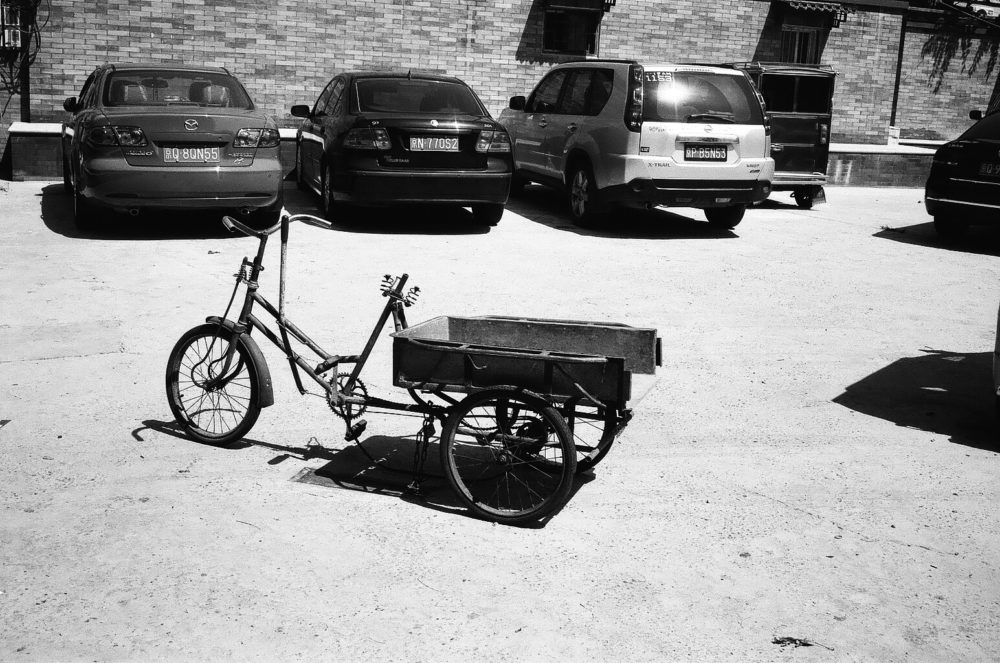 broken bicycle in a Beijing hutong