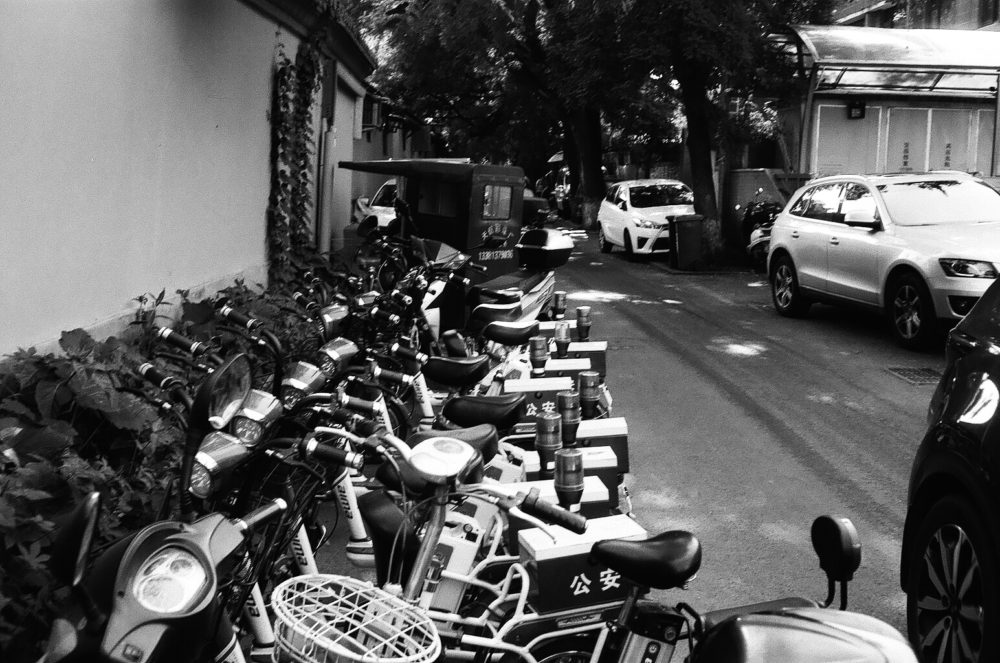 a row of bicycles in a Beijing hutong