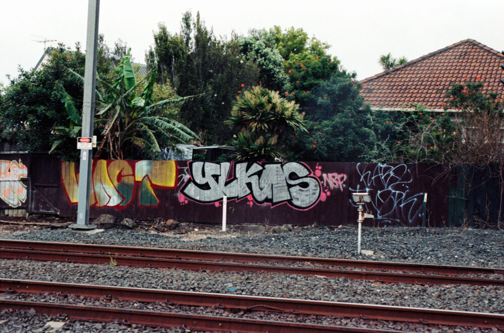 graffiti along railroad tracks in Auckland, NZ